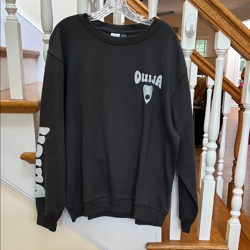 Classic Black Crewneck Sweater with White Sleeve Graphics